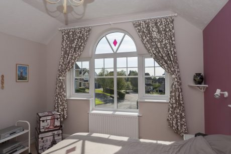 Bespoke made to measure UPVC Window with Arch Top Glass