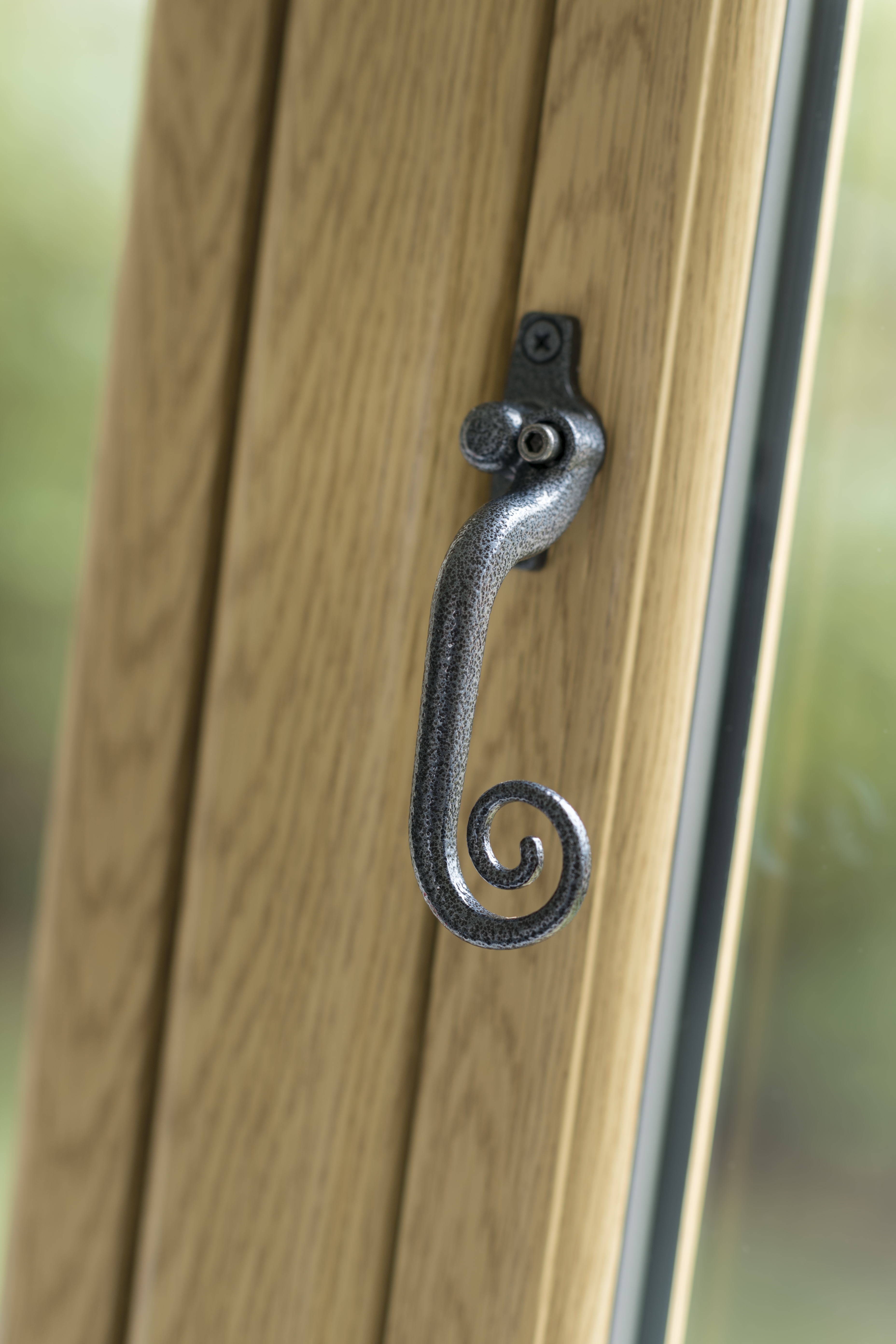 English Oak UPVc Flush Sash Window with Black Antique Monkey Tail Handle